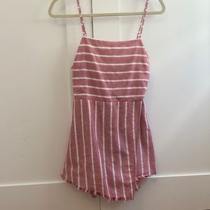 Cotton Candy LA asymmetrical romper. Red and white